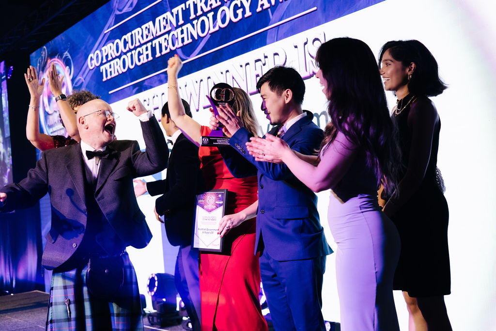 A winning team receiving their trophy